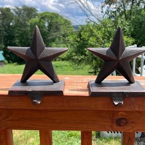 Vintage cast iron country star hangers.